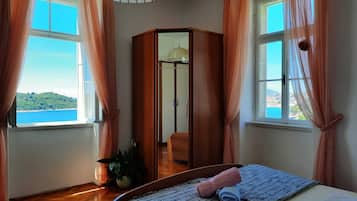 1 chambre, fer et planche Ă repasser, Wi-Fi gratuit, draps fournis