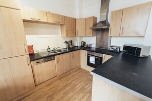 Standard Apartment | Private kitchen | Full-size fridge, microwave, oven, stovetop