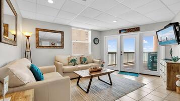 Condo, Multiple Beds, Balcony, Ocean View (GALLEON BAY 407) | Living area | 40-inch flat-screen TV with cable channels, TV