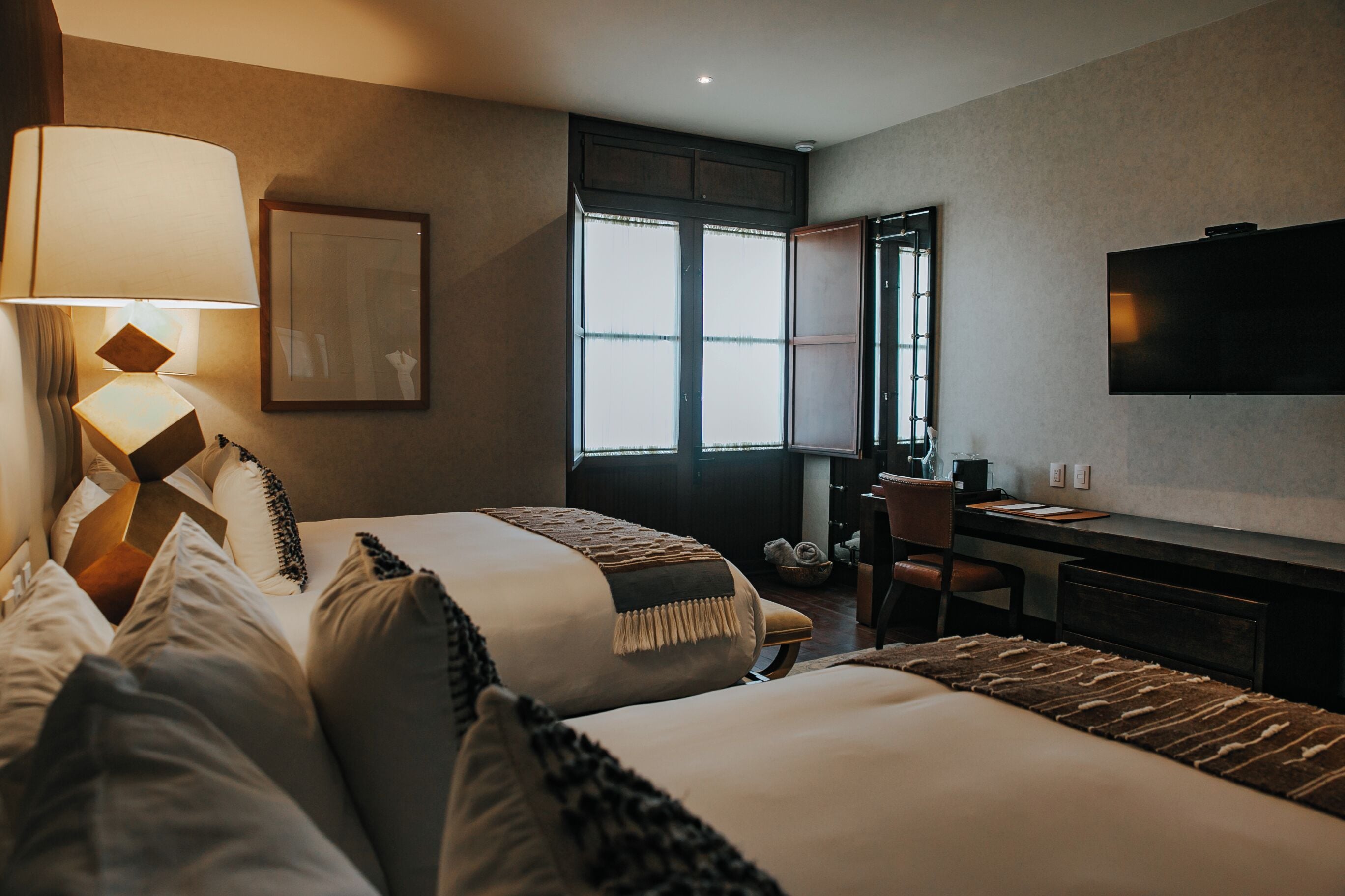 junior double room, 2 queen beds, vineyard view | premium bedding, minibar, in-room safe, laptop workspace