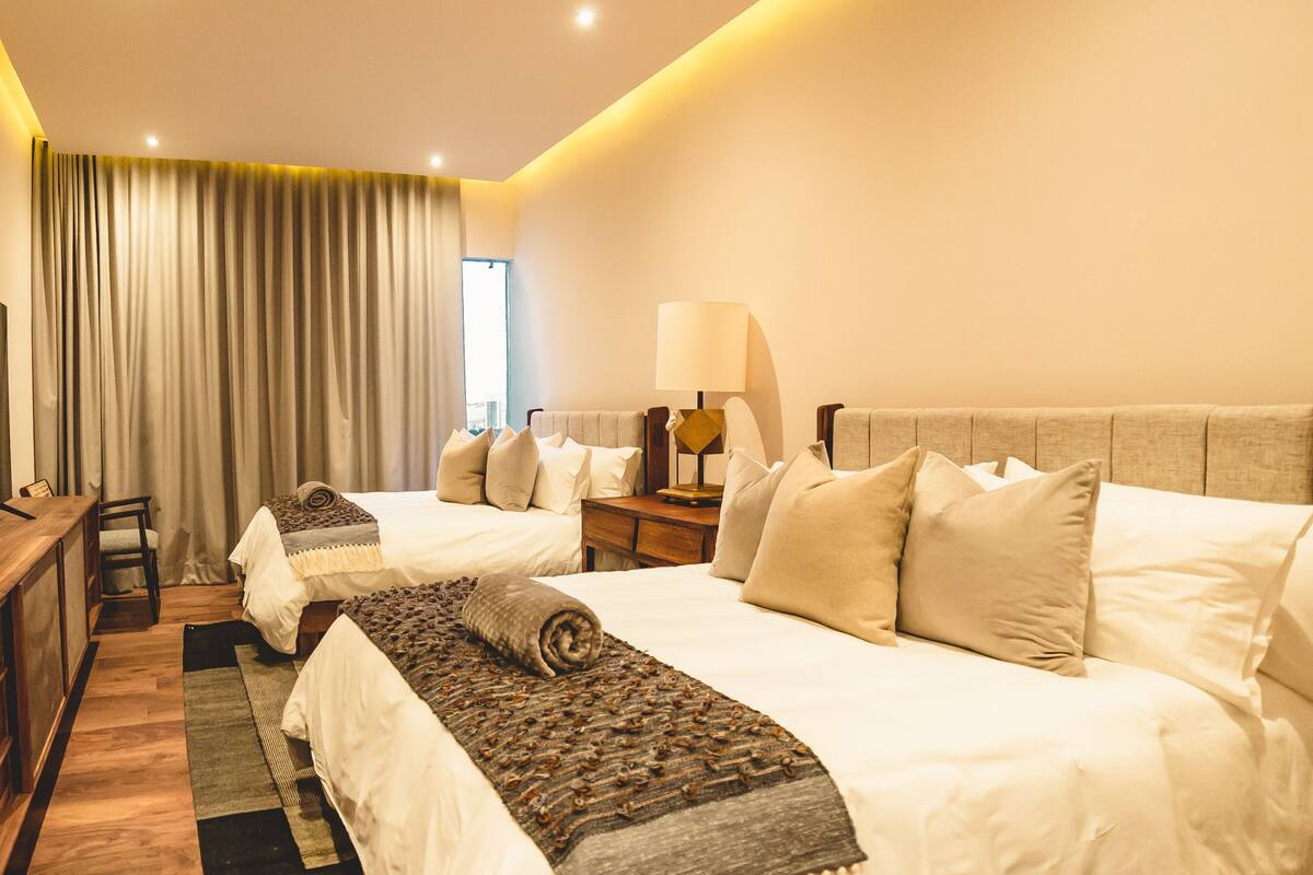 presidential studio suite, 1 bedroom, pool view, poolside | premium bedding, minibar, in-room safe, laptop workspace