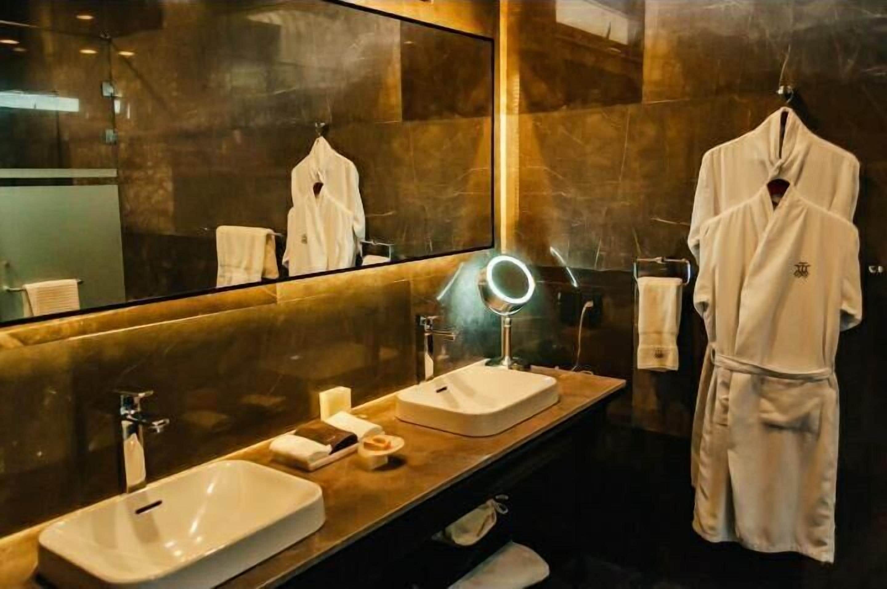 comfort room, 1 king bed | bathroom | hair dryer, bathrobes, slippers, towels