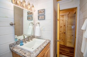 Combined shower/bathtub, hair dryer, towels, soap