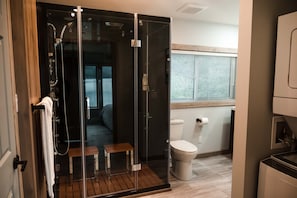 Shower, hair dryer, towels, soap