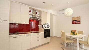 Appartamento | Cucina privata | Bollitore elettrico, pentole/stoviglie/utensili