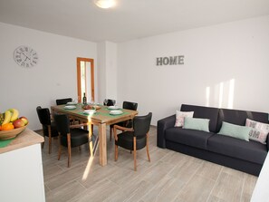 Ferienhaus | Wohnzimmer | Kamin