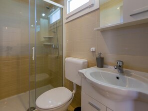 Bathroom | Shower, hair dryer, towels
