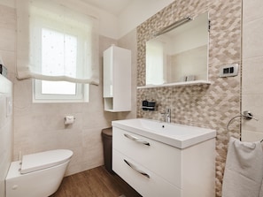 Villa | Bathroom | Bathtub, towels