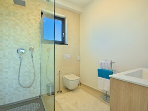 Villa | Bathroom | Bathtub, towels