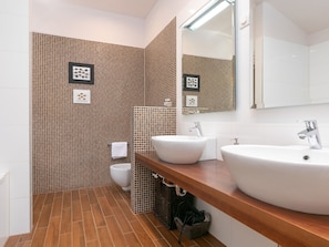Villa | Bathroom | Bathtub, towels