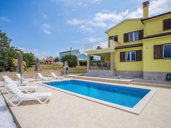 Outdoor pool, sun loungers