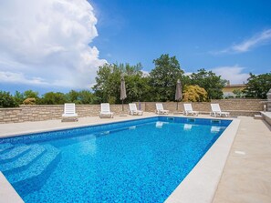 Outdoor pool, sun loungers