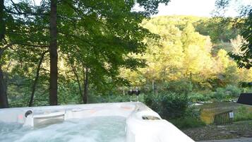 House, Multiple Beds (River Time Cabin -Time floats away!) | Outdoor spa tub