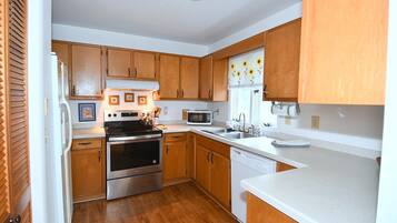 House, Multiple Beds (Serendipity - Large 5BR with a Hot Tu) | Private kitchen | Oven, stovetop, spices, cleaning supplies