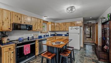 House, Multiple Beds (Sqyrls Nest - 3BR Retreat With a Hot ) | Private kitchen | Fridge, dishwasher, spices, freezer