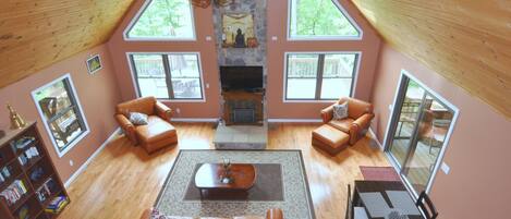 Ferienhaus, Mehrere Betten (Rivers Tranquility) | Wohnzimmer | Kamin