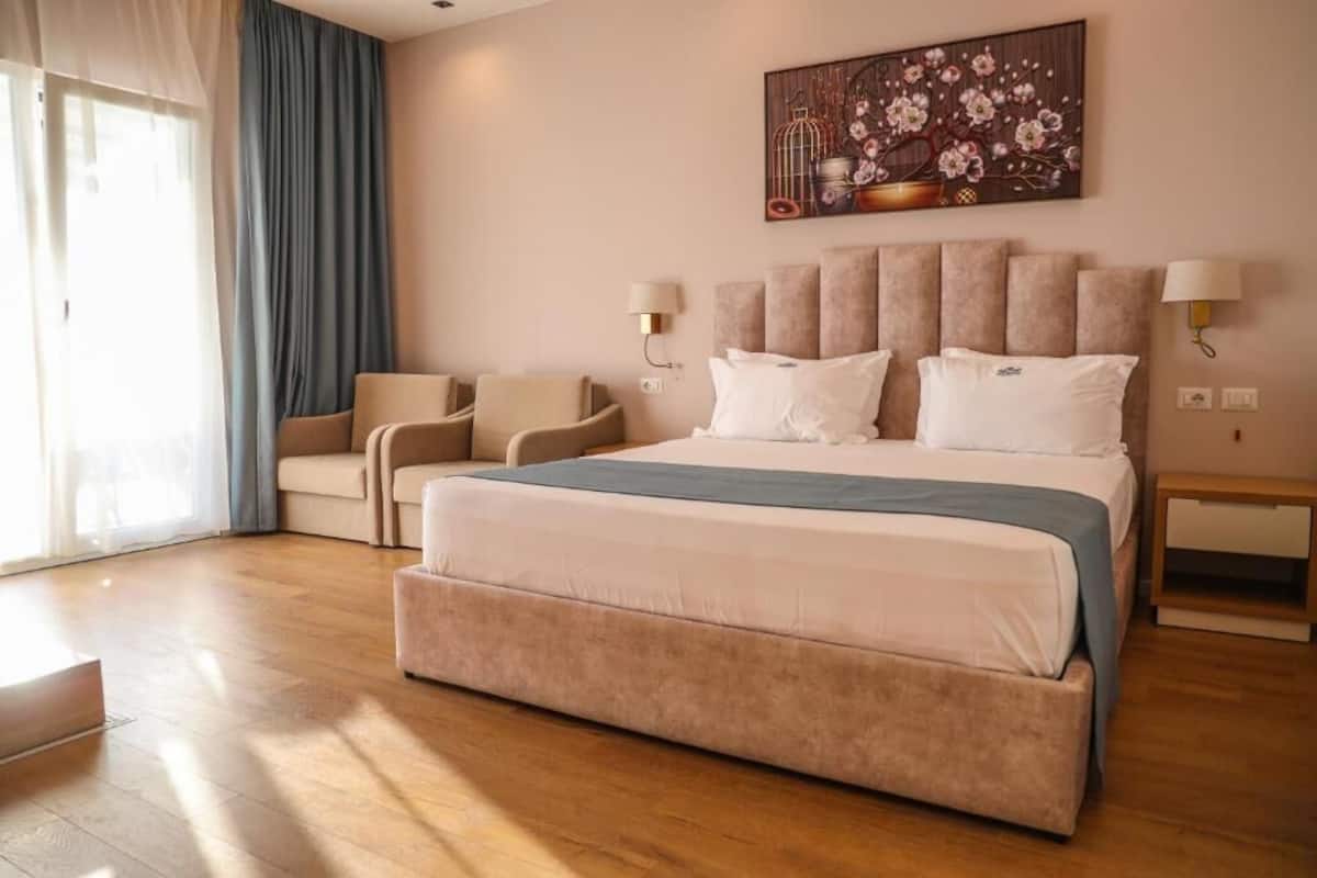 Suite Deluxe, vista al mar | 1 habitación, insonorización, wifi gratis y ropa de cama