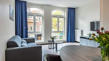 Apartment | Living area | 43-inch Smart TV with cable channels, TV, Netflix