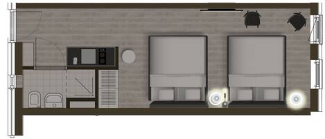 A hotel room layout with two beds, a small kitchenette, a bathroom, and a seating area.
