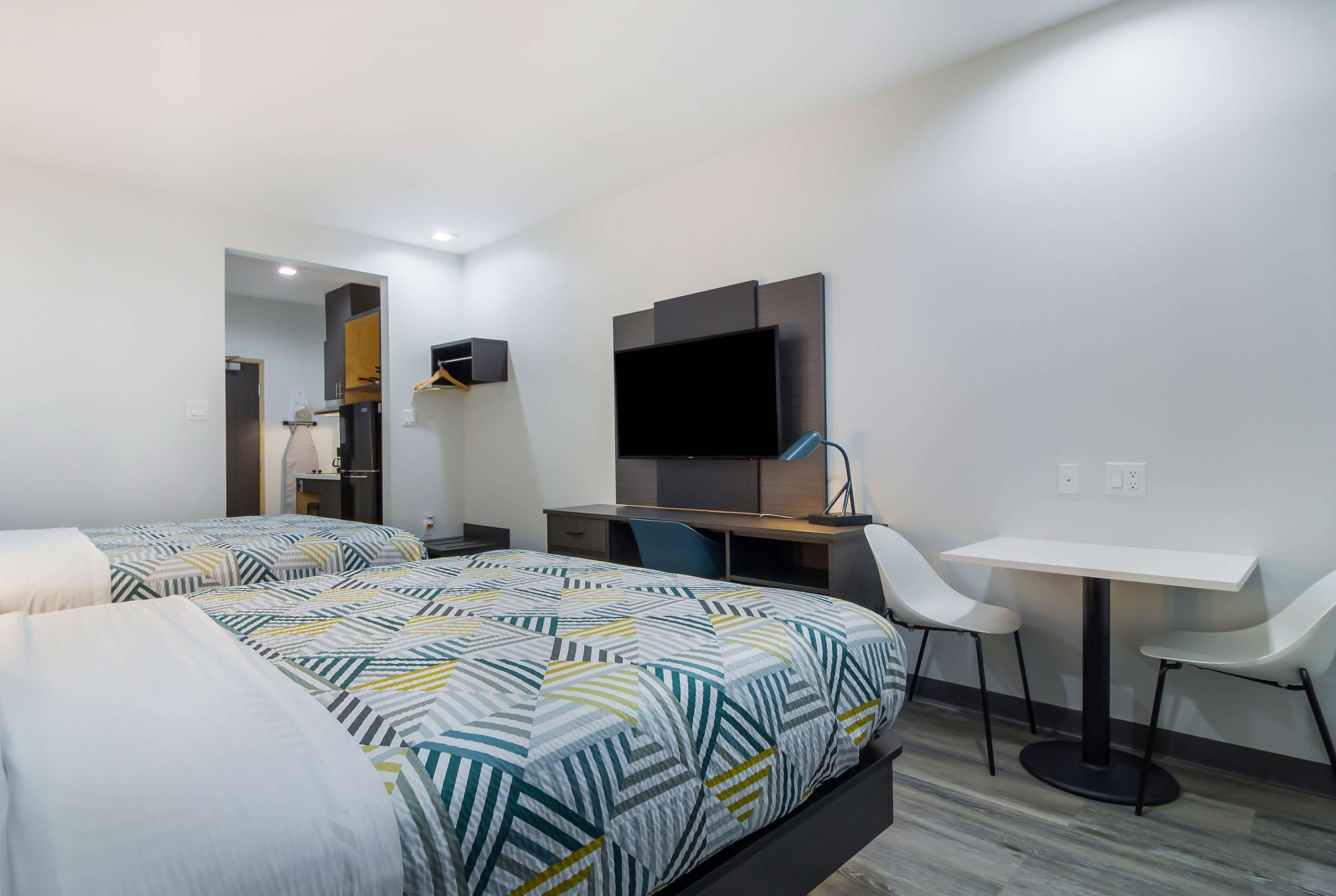 Deluxe Room, 2 Queen Beds, Non Smoking, Kitchenette | Desk, free WiFi, bed sheets