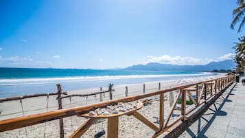 Private beach, white sand, sun-loungers, beach umbrellas