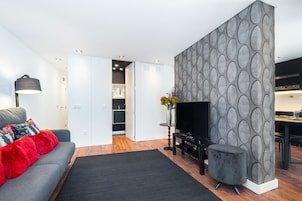 Apartamento, 3 quartos, para não fumantes | Área de estar | TV de tela plana