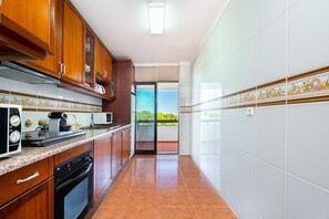 Apartment, 1 Bedroom, Non Smoking | Private kitchen | Full-size fridge, microwave, oven, stovetop