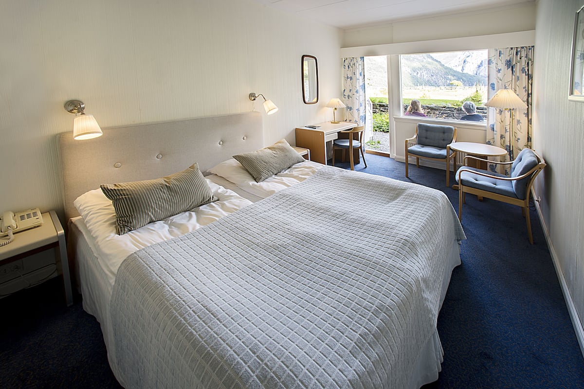Double Room | Iron/ironing board, cribs (surcharge), WiFi (free), bed sheets