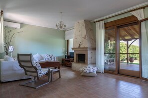 Villa | Living room | Flat-screen TV - halu! Modern Villa w Pool & Tennis (Kassandra)