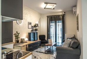 Appartement Deluxe | Salle de séjour | Télévision LCD, Netflix, services de streaming