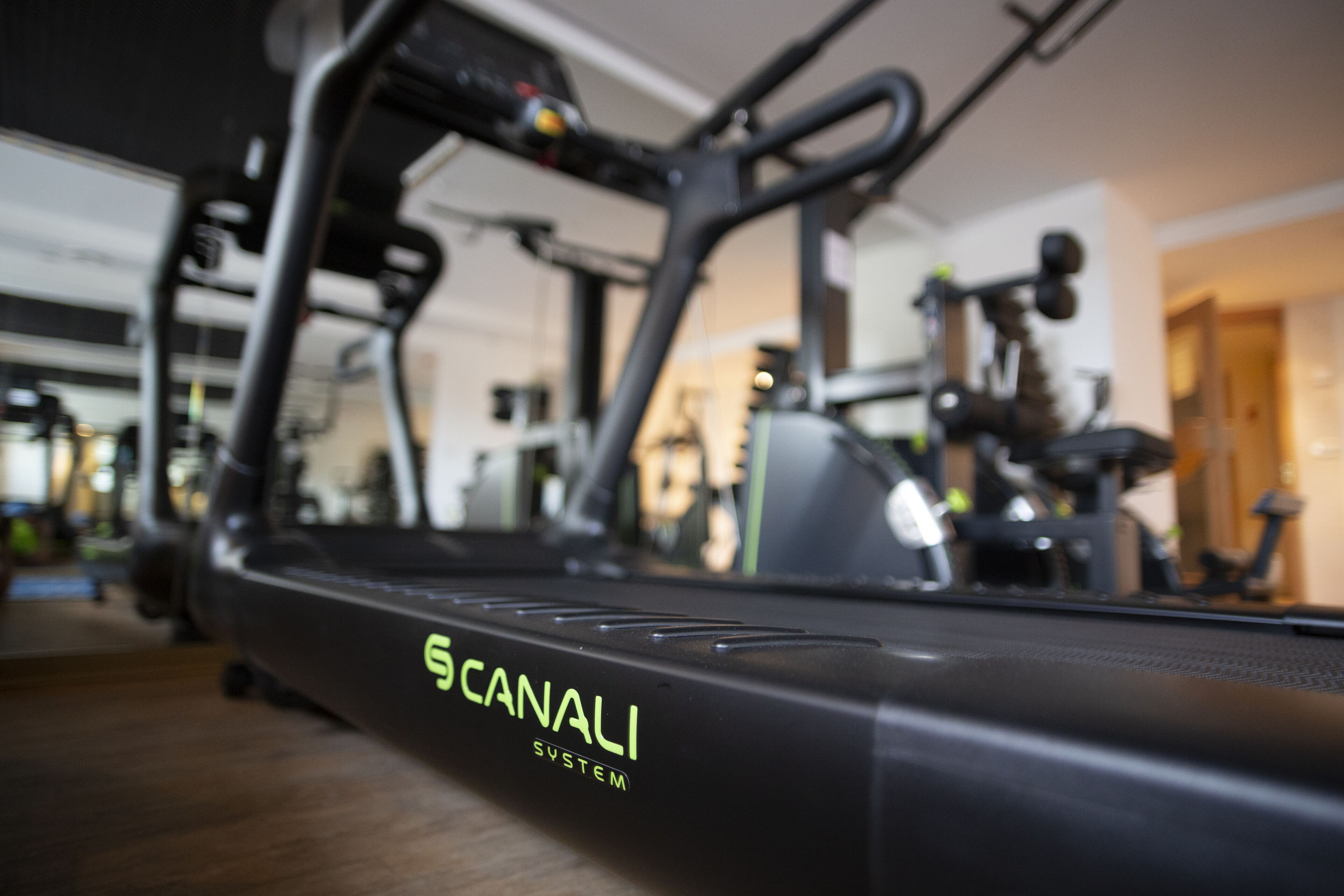 A treadmill with the brand name "CANALI SYSTEM" visible on its side.