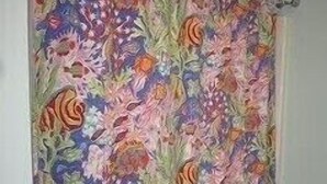 A room with a colorful floral curtain. - Less Than 1 Mile to Point of Rocks Beach (2186) (Brewster)