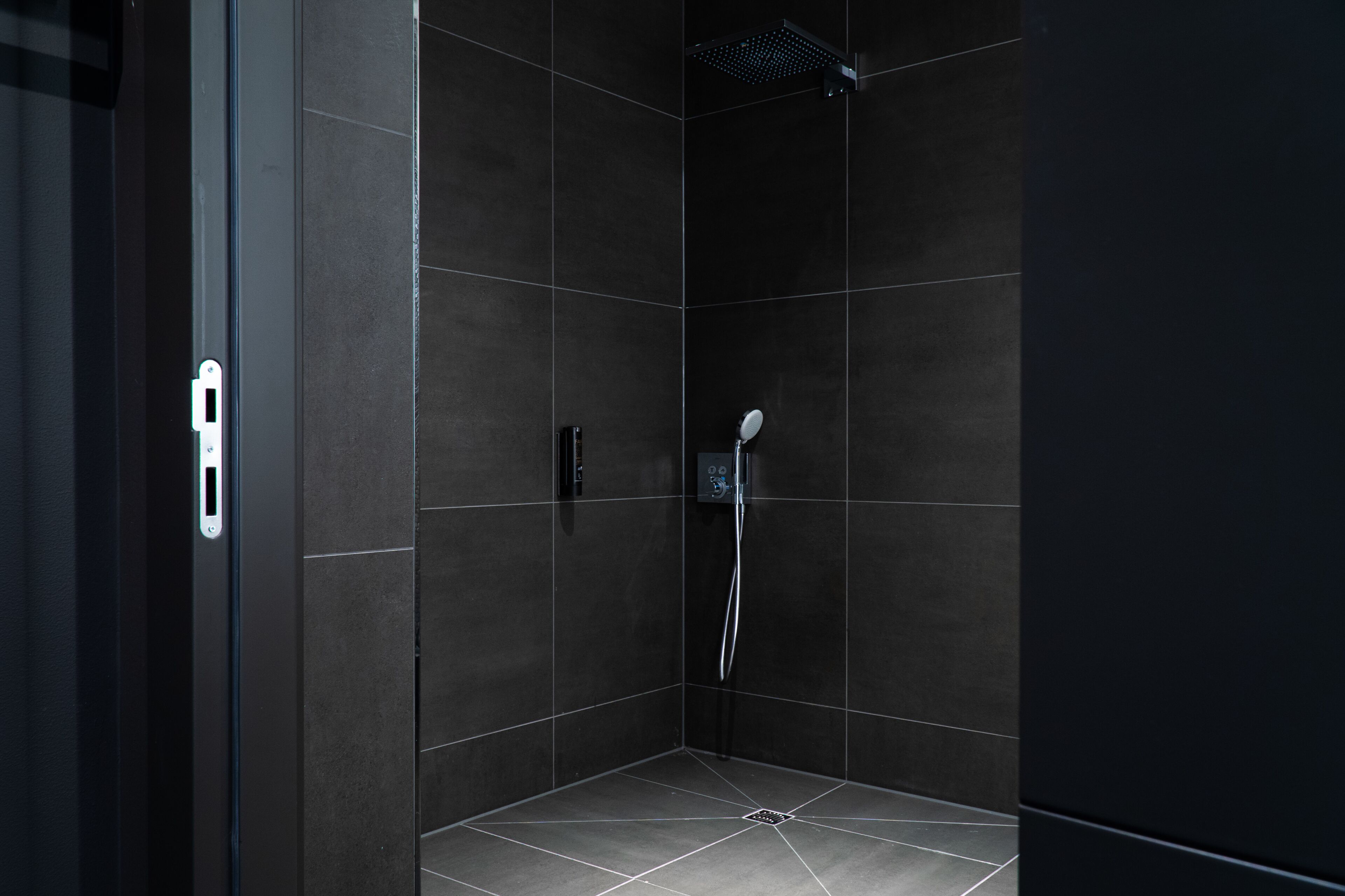 shower, hair dryer, bathrobes, slippers