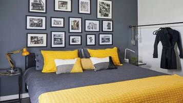 1 bedroom, desk, iron/ironing board, travel crib