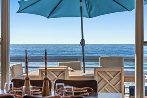 Dine al fresco with ocean views from this outdoor dining area.