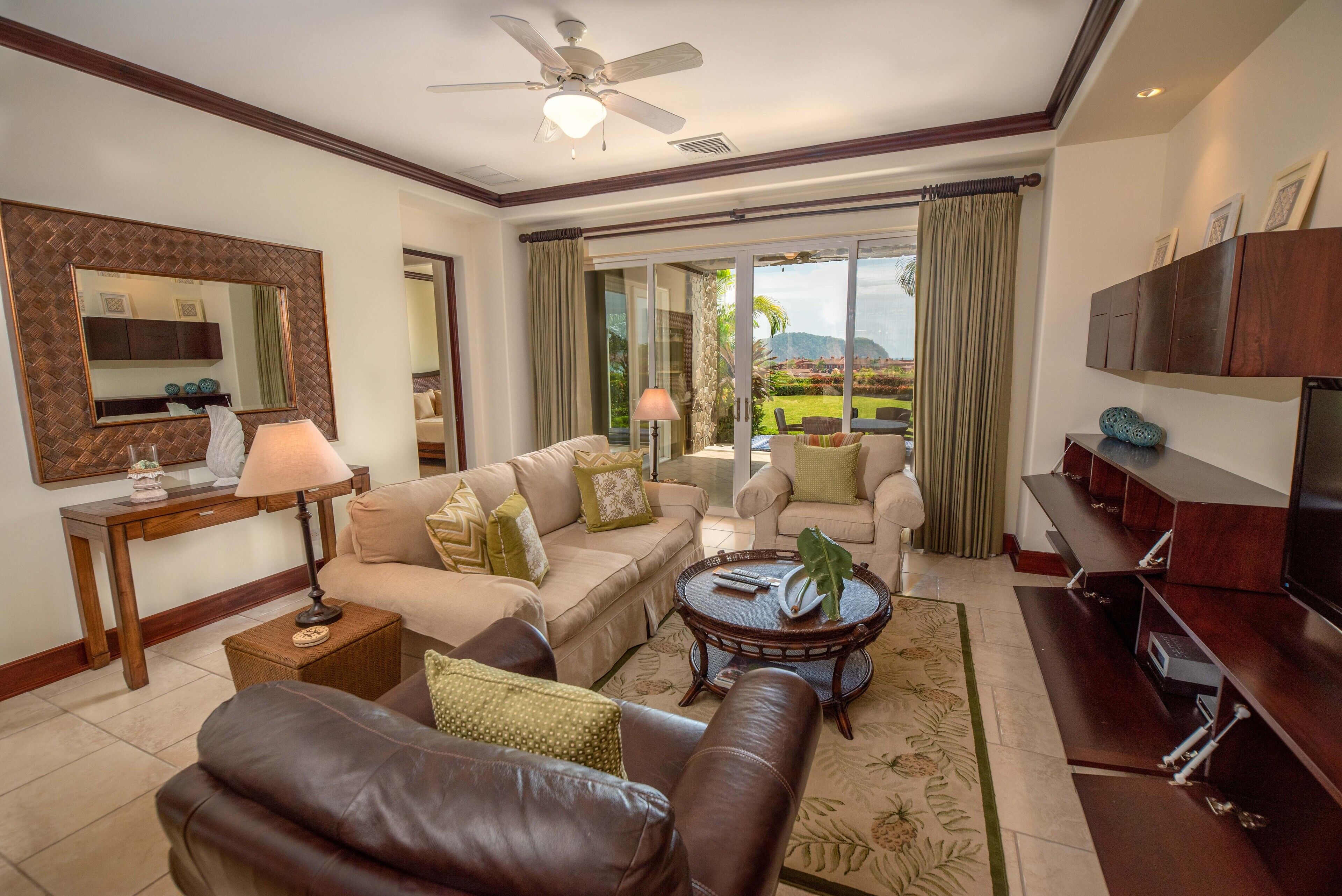 Premium Condo, Terrace, Partial Ocean View | Living area | Flat-screen TV