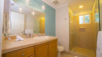 Deluxe Condo, 2 Bathrooms, Garden View | Bathroom | Hair dryer, towels, toilet paper