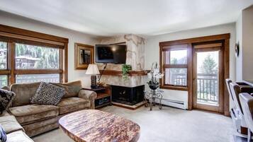 Condo (Vail Lion Square 1 Bed Gold) | Living room | Flat-screen TV, fireplace