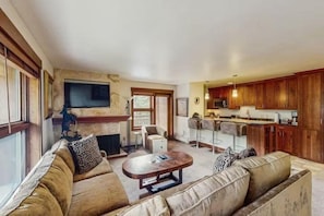 Condo (Vail Lion Square 1 Bed Gold) | Living room | Flat-screen TV, fireplace - Ski in, Ski out 1 Bedroom Vacation Rental in the Heart of Lionshead Village with Heated Slope Side Pool and Hot Tub (Vail)