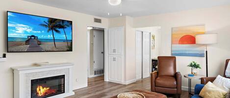 Een televisie, een open haard, videogames en een dvd-speler