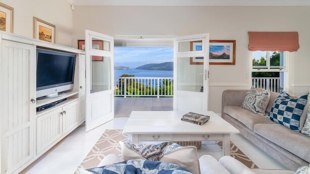 Standard Suite, 3 Bedrooms | Living area | Flat-screen TV - Corner House (Knysna)