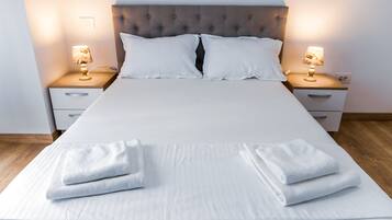 1 slaapkamer, een strijkplank/strijkijzer, wifi, beddengoed