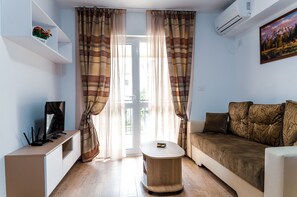 Flat-screen TV - Luxury Apartments by Glam (Iasi)