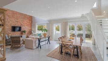 Comfort Cottage, 3 Bedrooms | Living area | Flat-screen TV, Netflix, streaming services