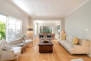 Standard Cottage, 3 Bedrooms | Living room | Flat-screen TV - Island Cottage (Knysna)