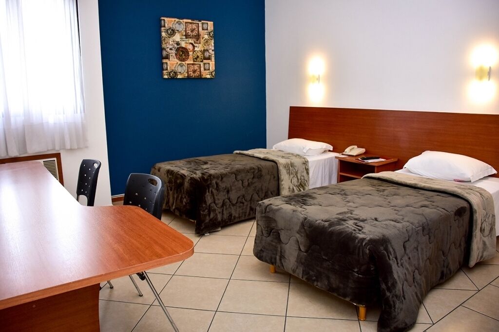 hypo-allergenic bedding, desk, laptop workspace, free wifi