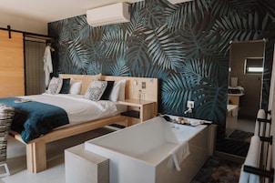 Luxury Suite, 1 Bedroom | Bathroom | Separate tub and shower, free toiletries, hair dryer, bathrobes
