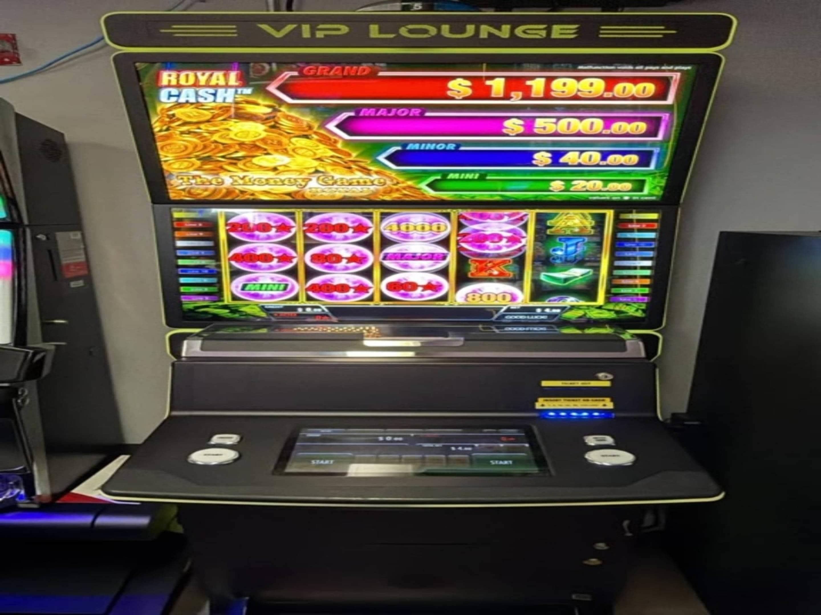A slot machine with various prize levels displayed, including $1,199.00 for the grand prize.