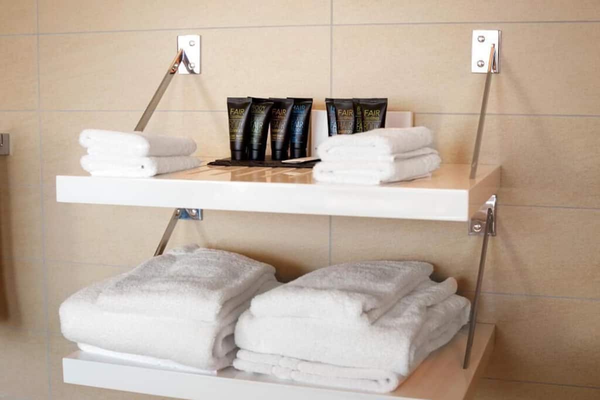 junior room, lake view | bathroom | free toiletries, hair dryer, slippers, towels