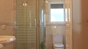 Shower, towels, soap, shampoo